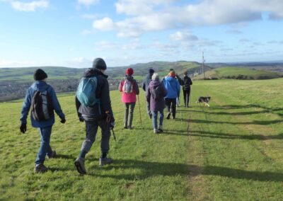 Photo of group approaching Corfe Castle from Brenscombe Hill, January 6, 2024