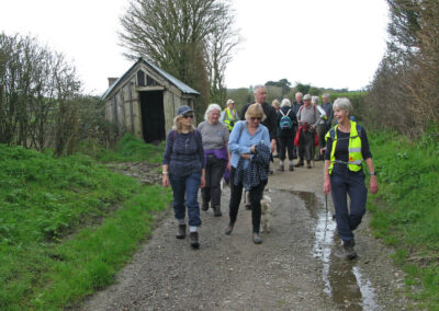 Photo of walkers on old railway line between Abbotsbury and Weymouth (closed in about 1953) – March 20, 2024