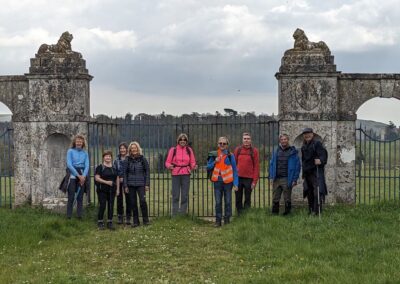Photo of walkers outside the gateway at North Lodges, Lulworth Castle, Coombe Keynes – April 24, 2024