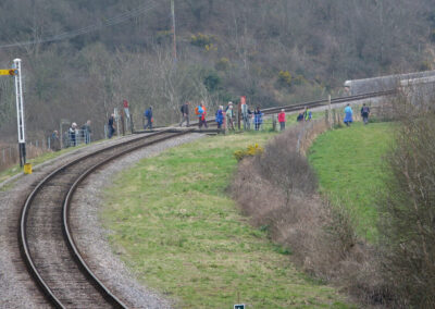 Photo of walkers crossing the railway line at Corfe Castle – March 19, 2025