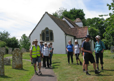 Photo of walkers at the Church of All Saints, Chalbury – May 31, 2025