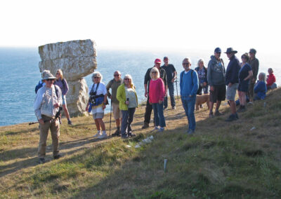 Group photo taken on the ledge below the Purbeck Radar Memorial – June 2, 2025