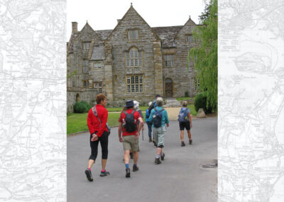 Photo of walkers leaving Cerne Abbas – June 25, 2025