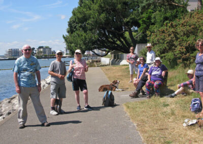 Photo of walkers on the harbour-side path at Lilliput – July 9, 2025