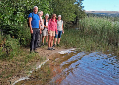 Photo of walkers beside Little Sea – July 17, 2025
