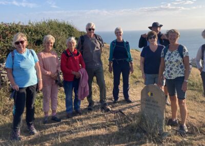 Group photo taken above Chapman's Pool – July 28, 2025