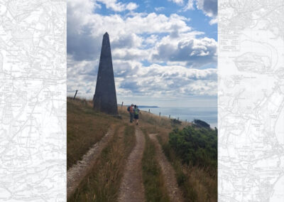 Photo taken on coast path near an obelisk erected as a navigational beacon for shipping – July 30, 2025