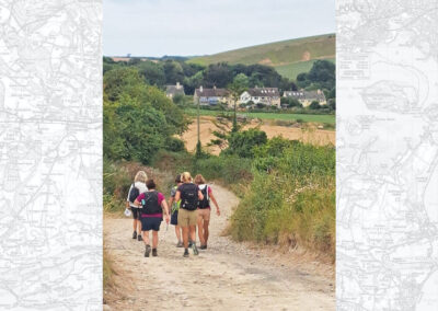 Photo of walkers nearing the end off the walk – July 30, 2025