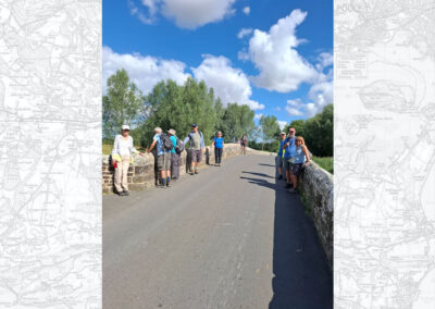 Photo of walkers on old stone bridge in Spetisbury – August 2, 2025