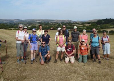 Group photo with Swanage Railway in the background and Corfe Castle in the far distance – August 23, 2025