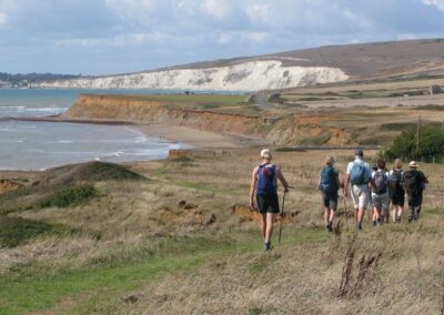 Isle of Wight HF Holiday: Photo of walkers with Freshwater Bay in the far distance – September 5, 2025