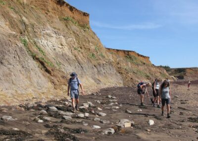 Isle of Wight HF Holiday: Photo of walkers beachcombing – September 5, 2025