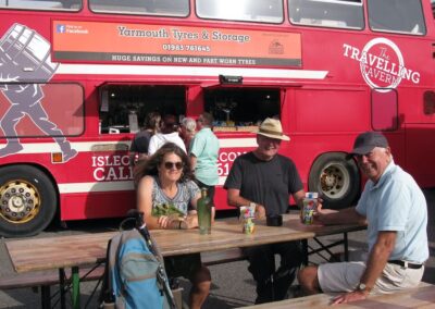 Isle of Wight HF Holiday: Photo of walkers at the Freshwater Bay travelling tavern (a converted Isle of Wight 1989 Leyland Olympian bus) – September 5, 2025
