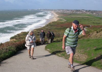 Photo of walkers climbing Hengistbury Head – October 4, 2025