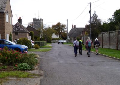 Photo of walkers approaching St Andrew's Church at West Stafford – October 8, 2025