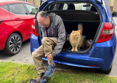 Photo of SWWG member with a friendly cat – October 8, 2025