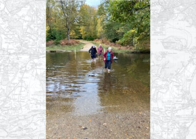 Photo of walkers wading across a ford – November 1, 2025