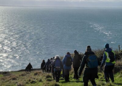 Photo of walkers' descent to the coast path – November 19, 2025