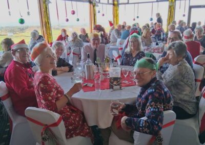 Photo of walking group members enjoying Christmas Lunch – December 10, 2025