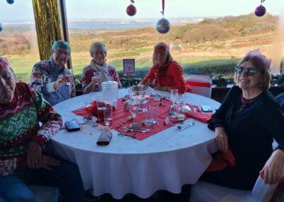 Photo of walking group members enjoying Christmas Lunch – December 10, 2025