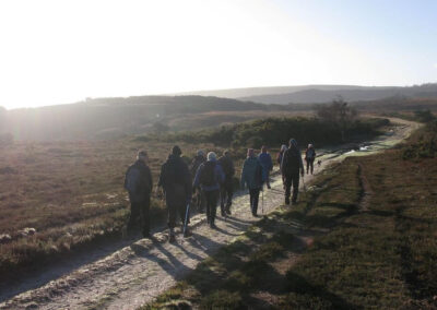 Photo of walkers heading out across Newton Heath – December 13, 2025