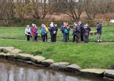 Photo of walking group by the River Frome in Wareham – December 17, 2025