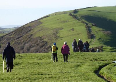 Photo of walkers descending Cocknowle – December 20, 2025