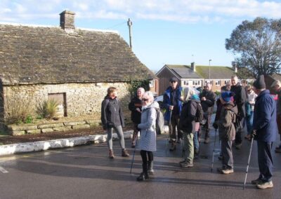 Photo of walkers at the weighbridge (once used to weigh stone lorries) near Swanage Bay View Holiday Park – February 4, 2026