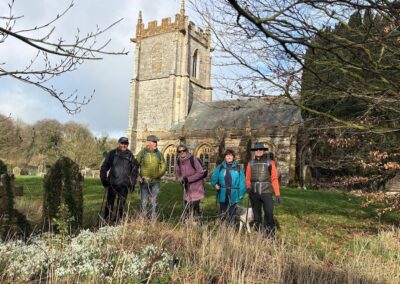 Walkers photographed at Sydling St Nicholas Church – February 11, 2026