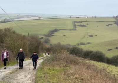 Photo of walkers ascending Hog Cliff Hill – February 11, 2026