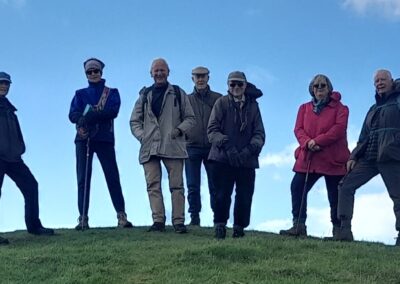 Group photo taken atop Nine Barrow Down – February 28, 2026