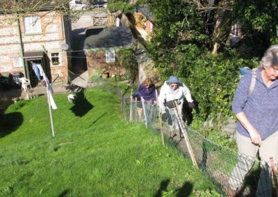 Photo of walkers in Pimperne, where the public footpath goes through someone's back garden – March 18, 2026
