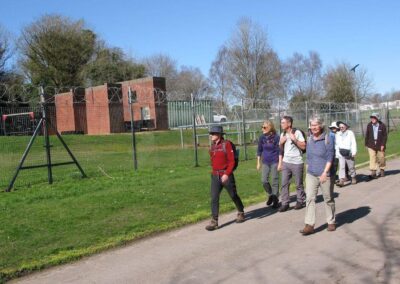 Photo of walkers beside an assault course at Blandford Camp – March 18, 2026