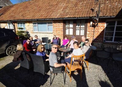 Group photo taken at Dorset's Crafty Barn and Tearoom after the walk – March 21, 2026