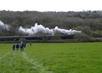 Photo of walkers near Herston with a London and South Western Railway T3 class locomotive in the background – March 28, 2026