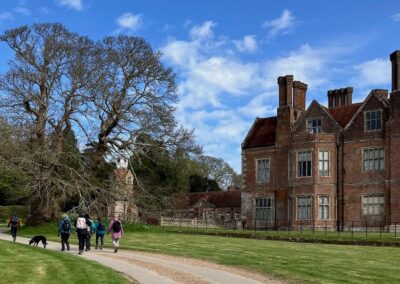 Photo of walkers passing Breamore House – April 11, 2026