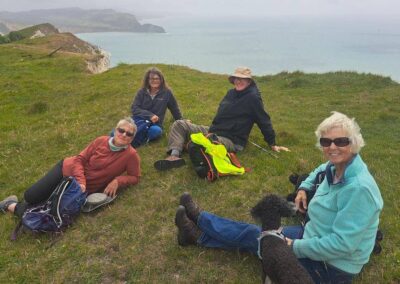 Photo of walkers taking a rest break on the coast path – June 7, 2026