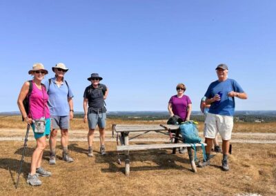 Photo of group against a backdrop of brilliant blue sky at the top of Bindon Hill – August 15, 2026