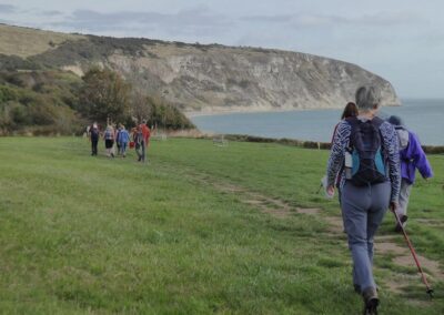 Photo of walkers with Ballard Down in background – September 19, 2026