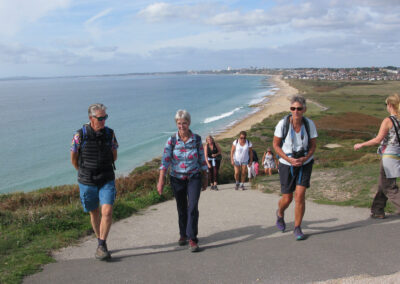 Photo of walkers climbing Hengistbury Head – September 26, 2026